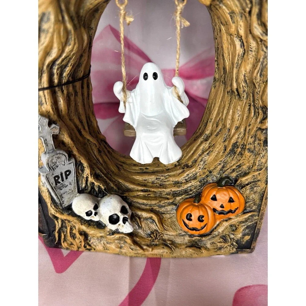 Halloween Ghost Swinging on Tree inside a book